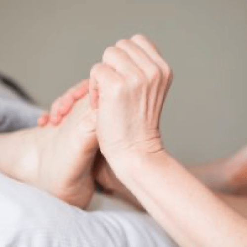 Person stretching foot