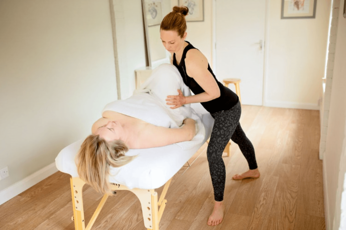 Caroline giving a leg massage